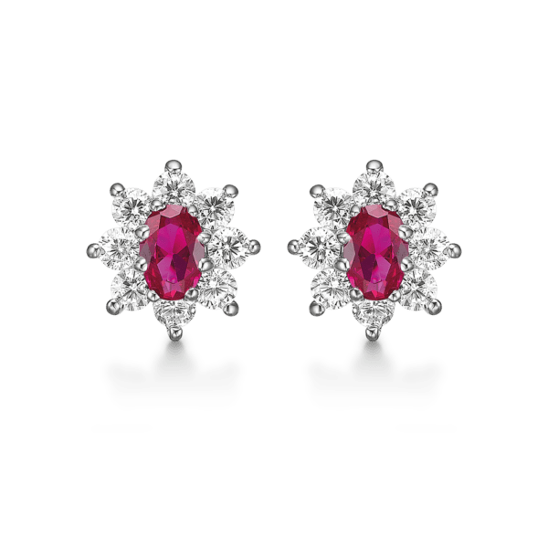 Silberne Ohrringe rhodinierter ovaler synthetischer Rubin mit 8 facettierten Zirkonia herum.